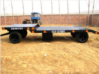 挖掘機(jī)拖車的具體作用是什么